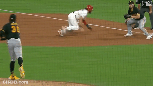 A Baseball Player With The Number 2 On His Jersey Is On The Ground GIF