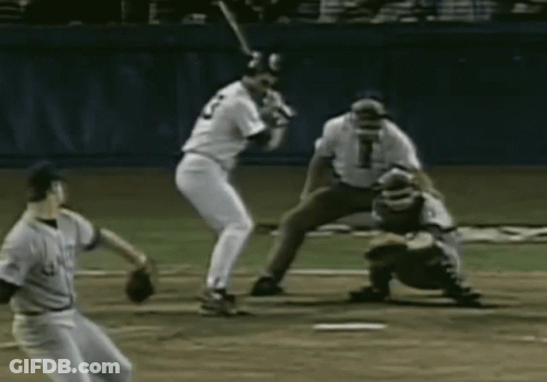 A Baseball Player With The Number 2 On His Jersey Is Swinging A Bat GIF