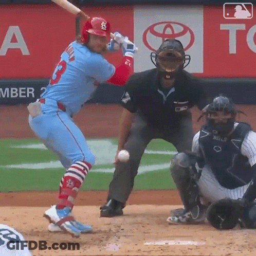A Baseball Player With The Number 2 On His Jersey Is Swinging His Bat GIF