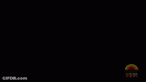 A Baseball Player With The Number 2 On His Jersey Stands In A Stadium GIF