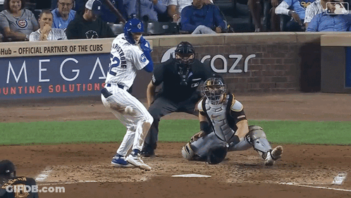 A Baseball Player With The Number 2 On His Jersey Swings At A Ball GIF