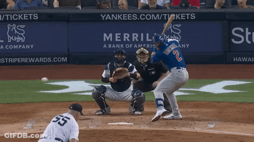 A Baseball Player With The Number 2 On His Jersey Swings His Bat GIF