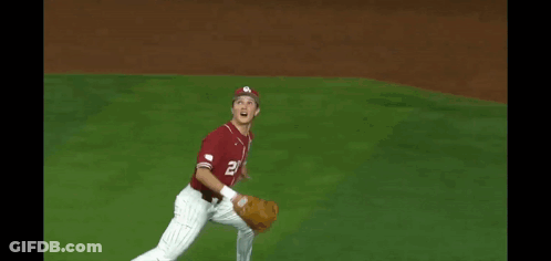 A Baseball Player With The Number 20 On His Shirt GIF