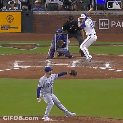 A Baseball Player With The Number 21 On His Back Is About To Hit The Ball GIF