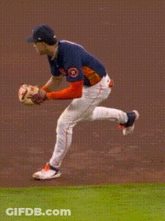 A Baseball Player With The Number 21 On His Back Is Getting Ready To Catch The Ball GIF