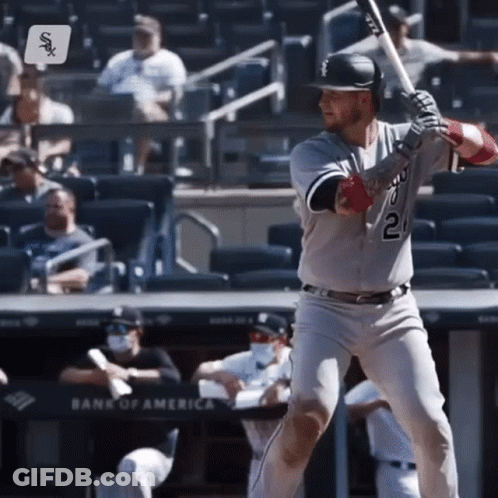 A Baseball Player With The Number 21 On His Jersey Is About To Swing His Bat GIF