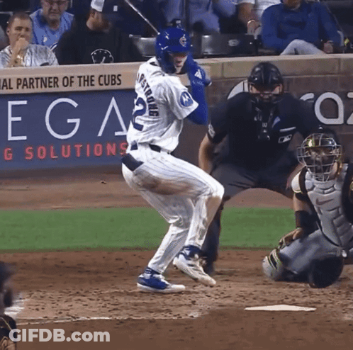 A Baseball Player With The Number 22 On His Jersey Is Swinging At A Pitch GIF
