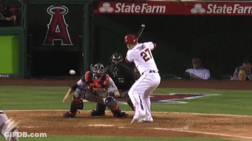 A Baseball Player With The Number 22 On His Jersey Swings His Bat GIF