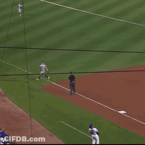 A Baseball Player With The Number 22 On His Jersey Throws A Ball GIF