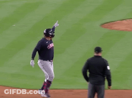 A Baseball Player With The Number 22 On The Back Of His Shirt GIF