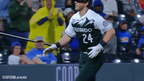 A Baseball Player With The Number 24 On His Jersey Is Running Towards Home Plate GIF