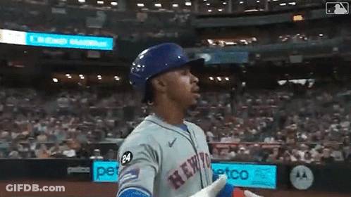 A Baseball Player With The Number 24 On His Jersey Is Standing On The Field GIF