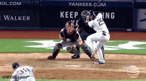 A Baseball Player With The Number 25 On His Jersey Swings At A Pitch GIF