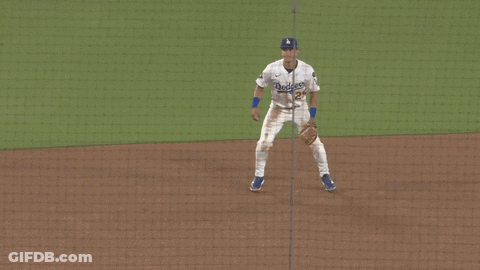 A Baseball Player With The Number 25 On His Shirt GIF