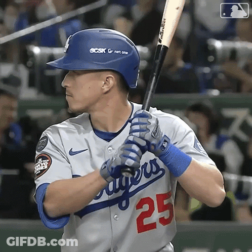 A Baseball Player With The Number 25 On His Shirt GIF