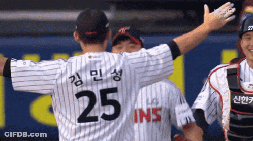 A Baseball Player With The Number 25 On The Back Of His Shirt GIF