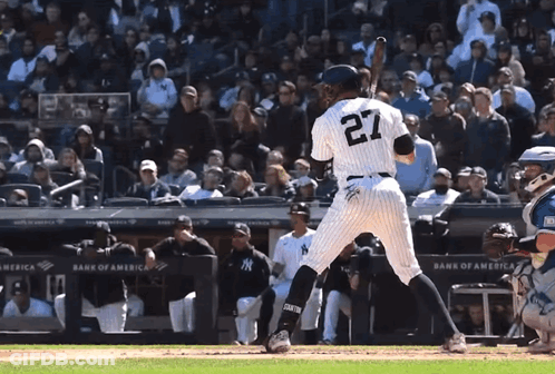 A Baseball Player With The Number 27 On The Back Of His Shirt GIF