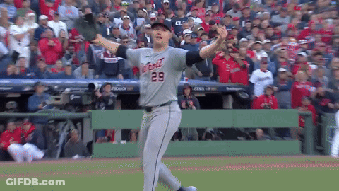 A Baseball Player With The Number 29 On His Jersey Throws A Ball GIF