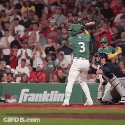 A Baseball Player With The Number 3 On His Back Swings At A Pitch GIF