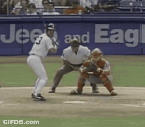 A Baseball Player With The Number 3 On His Jersey Swings At A Pitch GIF