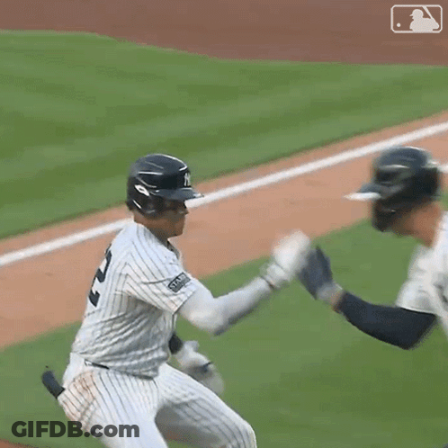A Baseball Player With The Number 3 On The Back Of His Shirt GIF
