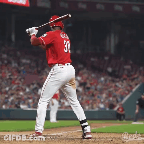 A Baseball Player With The Number 30 On His Jersey Getting Ready To Bat GIF
