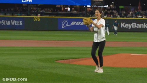 A Baseball Player With The Number 33 On His Jersey Is About To Catch A Ball GIF