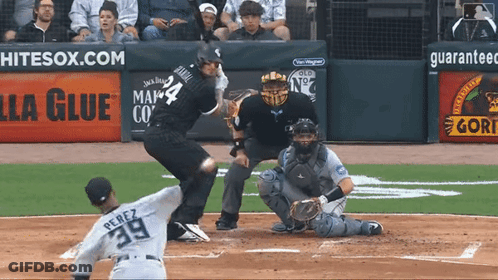 A Baseball Player With The Number 39 On The Back Of His Jersey Swings At A Pitch GIF