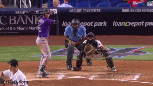 A Baseball Player With The Number 4 On His Back GIF