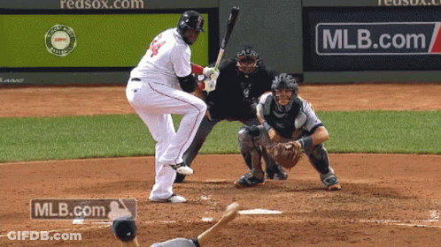 A Baseball Player With The Number 44 On His Jersey Swings At A Pitch GIF