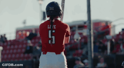 A Baseball Player With The Number 5 On Her Shirt GIF