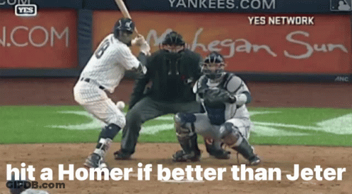 A Baseball Player With The Number 5 On His Jersey Swings At A Ball GIF