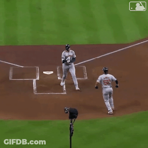 A Baseball Player With The Number 52 On His Jersey Is Running Towards The Base GIF