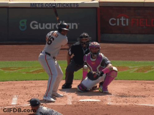 A Baseball Player With The Number 6 On His Jersey Swings At A Ball GIF