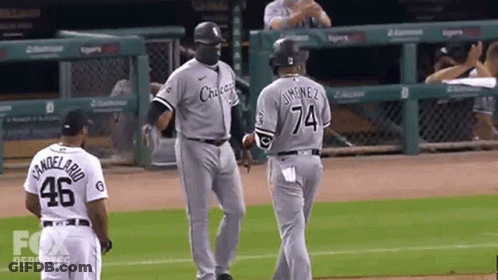 A Baseball Player With The Number 74 On His Jersey GIF