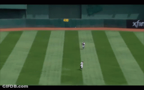A Baseball Player With The Number 8 On His Back Is Sliding Into Base GIF