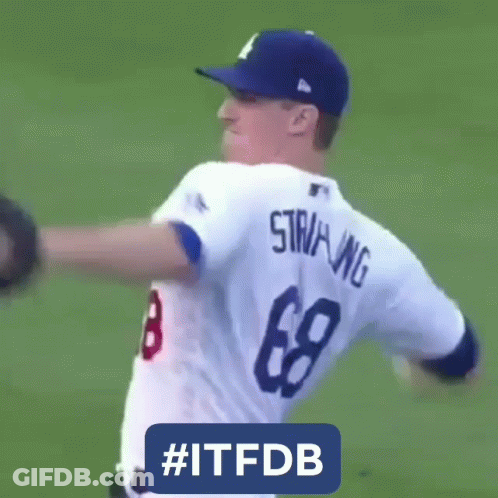 A Baseball Player With The Number 8 On His Jersey Is Throwing A Ball GIF