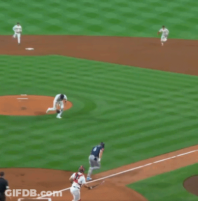 A Baseball Player With The Number 8 On His Jersey Is Walking Towards Another Player GIF