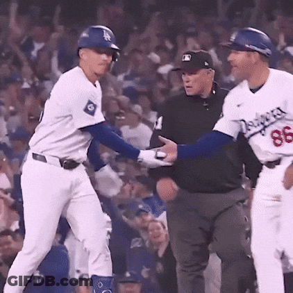 A Baseball Player With The Number 86 On His Jersey Is Talking To An Umpire GIF