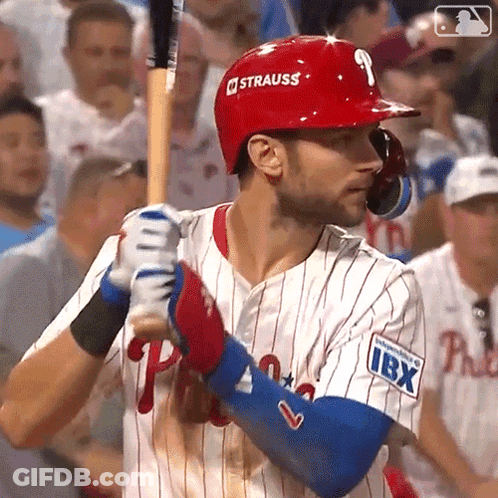 A Baseball Player With The Number 9 On His Helmet Is Holding A Bat GIF