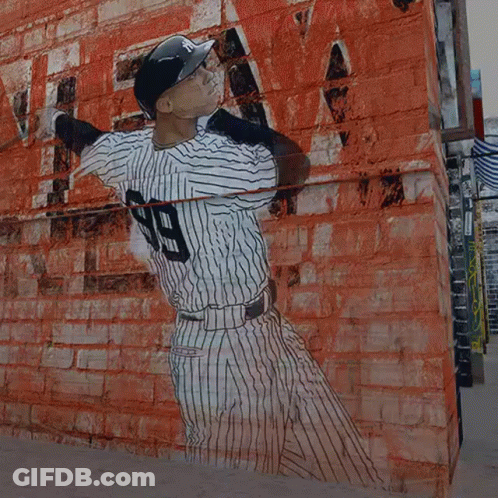 A Baseball Player With The Number 99 On His Shirt GIF