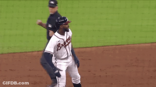 A Baseball Player With The Word Braves On His Jersey GIF