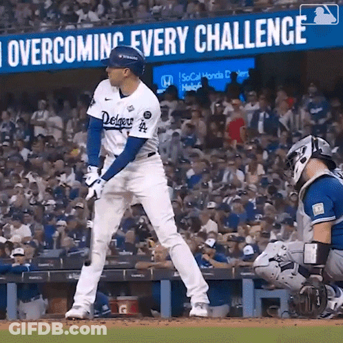 A Baseball Player With The Word Dodgers On His Uniform GIF