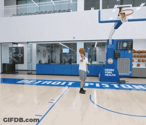 A Basketball Court With A Henry Ford Health Sign On It GIF