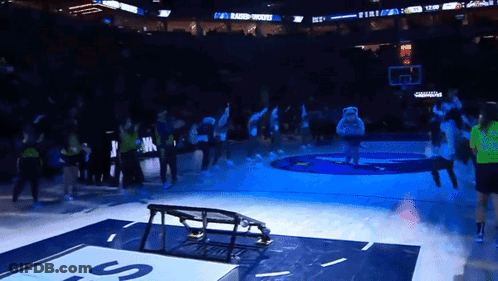 A Basketball Court With A Sign That Says ' Baker ' On It GIF