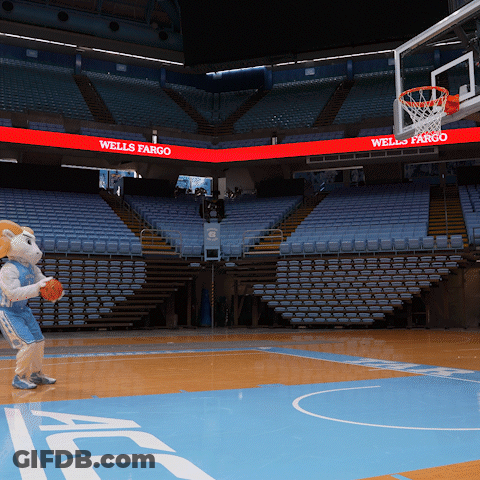 A Basketball Court With A Wells Fargo Sign Above It GIF