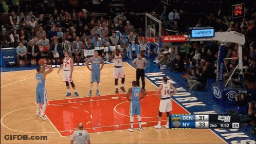 A Basketball Game Being Played In New York With The Score 31 To 33 GIF