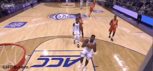 A Basketball Game Being Played On A Court That Says Acc GIF