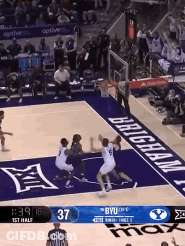 A Basketball Game Between Byu And Brigham Is Going On GIF