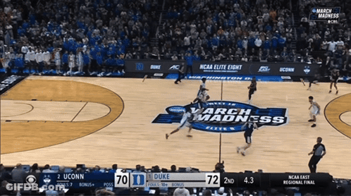 A Basketball Game Between Duke And Uconn Is Going On GIF